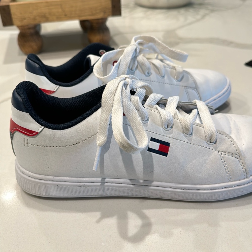 White sneakers worn once outside